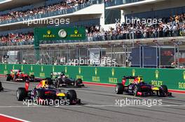 (L to R): Sebastian Vettel (GER) Red Bull Racing RB9 and Mark Webber (AUS) Red Bull Racing RB9 at the start of the race. 17.11.2013. Formula 1 World Championship, Rd 18, United States Grand Prix, Austin, Texas, USA, Race Day.