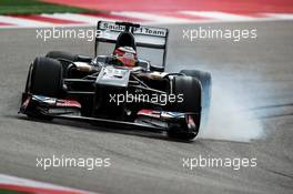 Nico Hulkenberg (GER) Sauber C32 locks up under braking. 16.11.2013. Formula 1 World Championship, Rd 18, United States Grand Prix, Austin, Texas, USA, Qualifying Day.