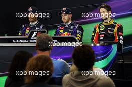 Qualifying top three in the FIA Press Conference (L to R): Mark Webber (AUS) Red Bull Racing, second; Sebastian Vettel (GER) Red Bull Racing, pole position; Romain Grosjean (FRA) Lotus F1 Team, third.. 16.11.2013. Formula 1 World Championship, Rd 18, United States Grand Prix, Austin, Texas, USA, Qualifying Day.