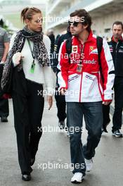 Fernando Alonso (ESP) Ferrari with his girlfriend Dasha Kapustina (RUS). 16.11.2013. Formula 1 World Championship, Rd 18, United States Grand Prix, Austin, Texas, USA, Qualifying Day.