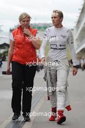 Max Chilton (GBR) Marussia F1 Team with Laura Booth (GBR) Marussia F1 Team. 16.11.2013. Formula 1 World Championship, Rd 18, United States Grand Prix, Austin, Texas, USA, Qualifying Day.