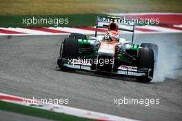 Adrian Sutil (GER) Sahara Force India VJM06 locks up under braking. 16.11.2013. Formula 1 World Championship, Rd 18, United States Grand Prix, Austin, Texas, USA, Qualifying Day.