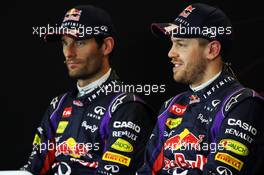 (L to R): Mark Webber (AUS) Red Bull Racing and team mate Sebastian Vettel (GER) Red Bull Racing in the FIA Press Conference. 16.11.2013. Formula 1 World Championship, Rd 18, United States Grand Prix, Austin, Texas, USA, Qualifying Day.