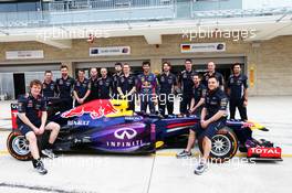 Mark Webber (AUS) Red Bull Racing with his team at a team photograph. 17.11.2013. Formula 1 World Championship, Rd 18, United States Grand Prix, Austin, Texas, USA, Race Day.