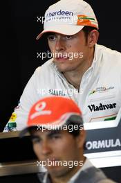 Paul di Resta (GBR) Sahara Force India F1 and Sergio Perez (MEX) McLaren in the FIA Press Conference. 14.11.2013. Formula 1 World Championship, Rd 18, United States Grand Prix, Austin, Texas, USA, Preparation Day.