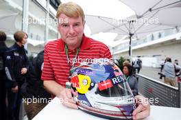 Rolf Carsjens, competition winner to design the US GP helmet of Sebastian Vettel (GER) Red Bull Racing. 14.11.2013. Formula 1 World Championship, Rd 18, United States Grand Prix, Austin, Texas, USA, Preparation Day.