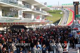 Fans on a pit lane walkabout. 14.11.2013. Formula 1 World Championship, Rd 18, United States Grand Prix, Austin, Texas, USA, Preparation Day.
