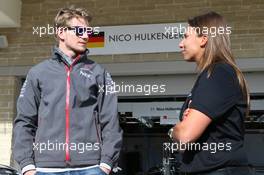 (L to R): Nico Hulkenberg (GER) Sauber with Simona de Silvestro (SUI) Indycar Driver. 14.11.2013. Formula 1 World Championship, Rd 18, United States Grand Prix, Austin, Texas, USA, Preparation Day.