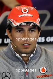 Sergio Perez (MEX) McLaren in the FIA Press Conference. 14.11.2013. Formula 1 World Championship, Rd 18, United States Grand Prix, Austin, Texas, USA, Preparation Day.