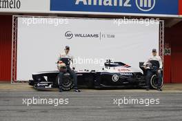 (L to R): Pastor Maldonado (VEN) Williams and team mate Valtteri Bottas (FIN) Williams unveil the new Williams FW35. 19.02.2013. Williams FW35 Launch, Barcelona, Spain.