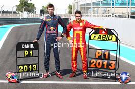 The 2013 Gp2 Champion (dx) Fabio Leimer (SUI), Racing Engineering and the 2013 Gp3 Champion Daniil Kvyat (RUS) MW Arden (sx) 02.11.2013. GP2 Series, Rd 11, Yas Marina Circuit, Abu Dhabi, UAE, Sunday.