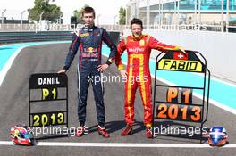 The 2013 Gp2 Champion (dx) Fabio Leimer (SUI), Racing Engineering and the 2013 Gp3 Champion Daniil Kvyat (RUS) MW Arden (sx) 03.11.2013. GP3 Series, Rd 8, Yas Marina Circuit, Abu Dhabi, UAE, Sunday.