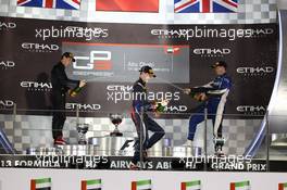 Race1 Podium, winner Daniil Kvyat (RUS) MW Arden, 2nd Alexander Sims (GBR) Carlin, 3rd Nick Yelloly (GBR) Carlin 02.11.2013. GP3 Series, Rd 8, Yas Marina Circuit, Abu Dhabi, UAE, Saturday.