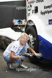 13.07.2013 Nürburgring, Germany,  A female mechanic working on the truck of Norbert Kiss (HUN), MAN, Team Oxxo Racing, Round 5