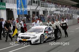 Paul Di Resta (GBR) Mercedes AMG DTM-Team HWA DTM Mercedes AMG C-Coupé comes slow in the pitlane 28.06.2014, Norisring, Nürnberg, Germany, Friday.