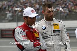 Timo Scheider (GER) Audi Sport Team Phoenix Audi RS 5 DTM and Martin Tomczyk (GER) BMW Team Schnitzer BMW M4 DTM 28.06.2014, Norisring, Nürnberg, Germany, Friday.