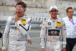 Robert Wickens (CAN) Mercedes AMG DTM-Team HWA DTM Mercedes AMG C-Coupé and Marco Wittmann (GER) BMW Team RMG BMW M4 DTM 28.06.2014, Norisring, Nürnberg.