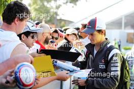 Esteban Gutierrez (MEX) Sauber signs autographs for the fans. 14.03.2014. Formula 1 World Championship, Rd 1, Australian Grand Prix, Albert Park, Melbourne, Australia, Practice Day.