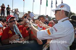 Nico Hulkenberg (GER) Sahara Force India F1 signs autographs for the fans. 14.03.2014. Formula 1 World Championship, Rd 1, Australian Grand Prix, Albert Park, Melbourne, Australia, Practice Day.