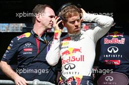 (L to R): Christian Horner (GBR) Red Bull Racing Team Principal with Sebastian Vettel (GER) Red Bull Racing. 14.03.2014. Formula 1 World Championship, Rd 1, Australian Grand Prix, Albert Park, Melbourne, Australia, Practice Day.