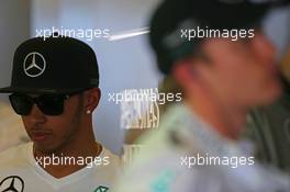 Lewis Hamilton (GBR) Mercedes AMG F1 and Nico Rosberg (GER) Mercedes AMG F1. 14.03.2014. Formula 1 World Championship, Rd 1, Australian Grand Prix, Albert Park, Melbourne, Australia, Practice Day.
