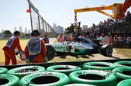 The Mercedes AMG F1 W05 of Lewis Hamilton (GBR) Mercedes AMG F1 is craned away from the circuit after it stopped on the out lap of FP1. 14.03.2014. Formula 1 World Championship, Rd 1, Australian Grand Prix, Albert Park, Melbourne, Australia, Practice Day.