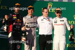 The podium (L to R): Daniel Ricciardo (AUS) Red Bull Racing, second; Nico Rosberg (GER) Mercedes AMG F1, race winner;  Andy Cowell (GBR) Mercedes-Benz High Performance Powertrains Managing Director; Kevin Magnussen (DEN) McLaren, third. 16.03.2014. Formula 1 World Championship, Rd 1, Australian Grand Prix, Albert Park, Melbourne, Australia, Race Day.