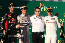 1st place Nico Rosberg (GER) Mercedes AMG F1 W05, 2nd place Daniel Ricciardo (AUS) Red Bull Racing RB10 and 3rd place Kevin Magnussen (DEN) McLaren MP4-29. 16.03.2014. Formula 1 World Championship, Rd 1, Australian Grand Prix, Albert Park, Melbourne, Australia, Race Day.