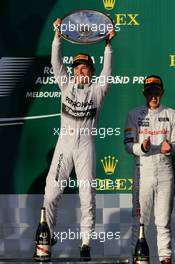 Nico Rosberg (GER), Mercedes AMG F1 Team and Kevin Magnussen (DEN), McLaren F1  16.03.2014. Formula 1 World Championship, Rd 1, Australian Grand Prix, Albert Park, Melbourne, Australia, Race Day.