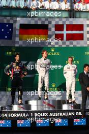 1st place Nico Rosberg (GER) Mercedes AMG F1 W05, 2nd place Daniel Ricciardo (AUS) Red Bull Racing RB10 and 3rd place Kevin Magnussen (DEN) McLaren MP4-29. 16.03.2014. Formula 1 World Championship, Rd 1, Australian Grand Prix, Albert Park, Melbourne, Australia, Race Day.