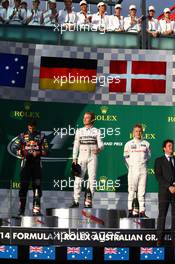 1st place Nico Rosberg (GER) Mercedes AMG F1 W05, 2nd place Daniel Ricciardo (AUS) Red Bull Racing RB10 and 3rd place Kevin Magnussen (DEN) McLaren MP4-29. 16.03.2014. Formula 1 World Championship, Rd 1, Australian Grand Prix, Albert Park, Melbourne, Australia, Race Day.