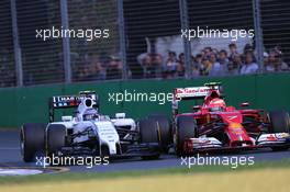 Valtteri Bottas (FIN), Williams F1 Team and Kimi Raikkonen (FIN), Scuderia Ferrari  16.03.2014. Formula 1 World Championship, Rd 1, Australian Grand Prix, Albert Park, Melbourne, Australia, Race Day.