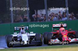 Valtteri Bottas (FIN), Williams F1 Team and Kimi Raikkonen (FIN), Scuderia Ferrari  16.03.2014. Formula 1 World Championship, Rd 1, Australian Grand Prix, Albert Park, Melbourne, Australia, Race Day.