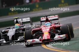 Fernando Alonso (ESP) Ferrari F14-T and Esteban Gutierrez (MEX) Sauber C33. 15.03.2014. Formula 1 World Championship, Rd 1, Australian Grand Prix, Albert Park, Melbourne, Australia, Qualifying Day.