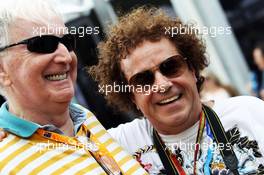 (L to R): John Watson (GBR) with Leo Sayer (AUS). 15.03.2014. Formula 1 World Championship, Rd 1, Australian Grand Prix, Albert Park, Melbourne, Australia, Qualifying Day.
