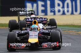 Sebastian Vettel (GER) Red Bull Racing RB10 leads Kevin Magnussen (DEN) McLaren MP4-29. 15.03.2014. Formula 1 World Championship, Rd 1, Australian Grand Prix, Albert Park, Melbourne, Australia, Qualifying Day.