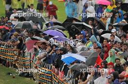 Fans in the rain during qualifying. 15.03.2014. Formula 1 World Championship, Rd 1, Australian Grand Prix, Albert Park, Melbourne, Australia, Qualifying Day.