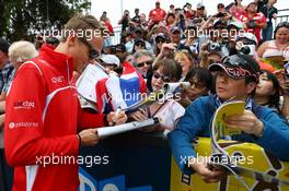 Max Chilton (GBR) Marussia F1 Team signs autographs for the fans. 15.03.2014. Formula 1 World Championship, Rd 1, Australian Grand Prix, Albert Park, Melbourne, Australia, Qualifying Day.