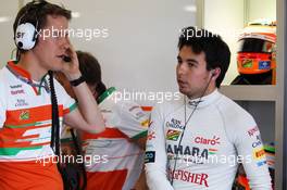 Sergio Perez (MEX) Sahara Force India F1 with Robert Sattler (BRA) Sahara Force India F1 Team Engineer. 15.03.2014. Formula 1 World Championship, Rd 1, Australian Grand Prix, Albert Park, Melbourne, Australia, Qualifying Day.