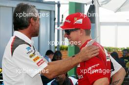 (L to R): Beat Zehnder (SUI) Sauber F1 Team Manager with Kimi Raikkonen (FIN) Ferrari. 13.03.2014. Formula 1 World Championship, Rd 1, Australian Grand Prix, Albert Park, Melbourne, Australia, Preparation Day.
