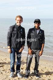 (L to R): Nico Rosberg (GER) Mercedes AMG F1 and team mate Lewis Hamilton (GBR) Mercedes AMG F1 on the beach. 13.03.2014. Formula 1 World Championship, Rd 1, Australian Grand Prix, Albert Park, Melbourne, Australia, Preparation Day.