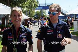 Sebastian Vettel (GER) Red Bull Racing with Britta Roeske (AUT) Red Bull Racing Press Officer. 13.03.2014. Formula 1 World Championship, Rd 1, Australian Grand Prix, Albert Park, Melbourne, Australia, Preparation Day.
