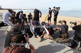 Lewis Hamilton (GBR) Mercedes AMG F1 on the beach with the media. 13.03.2014. Formula 1 World Championship, Rd 1, Australian Grand Prix, Albert Park, Melbourne, Australia, Preparation Day.