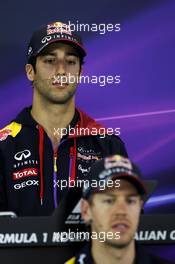 Daniel Ricciardo (AUS) Red Bull Racing and team mate Sebastian Vettel (GER) Red Bull Racing in the FIA Press Conference. 13.03.2014. Formula 1 World Championship, Rd 1, Australian Grand Prix, Albert Park, Melbourne, Australia, Preparation Day.