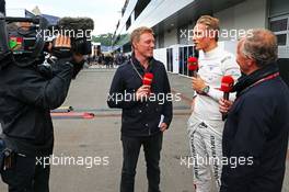 Max Chilton (GBR) Marussia F1 Team with Simon Lazenby (GBR) Sky Sports F1 TV Presenter (Left) and Johnny Herbert (GBR) Sky Sports F1 TV Presenter (Right). 20.06.2014. Formula 1 World Championship, Rd 8, Austrian Grand Prix, Spielberg, Austria, Practice Day.