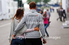 Jenson Button (GBR) McLaren with his girlfriend Jessica Michibata (JPN). 20.06.2014. Formula 1 World Championship, Rd 8, Austrian Grand Prix, Spielberg, Austria, Practice Day.