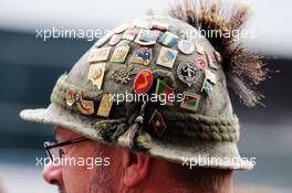 A fan with badges in his hat. 20.06.2014. Formula 1 World Championship, Rd 8, Austrian Grand Prix, Spielberg, Austria, Practice Day.