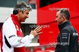 (L to R): Marco Mattiacci (ITA) Ferrari Team Principal with Paddy Lowe (GBR) Mercedes AMG F1 Executive Director (Technical). 20.06.2014. Formula 1 World Championship, Rd 8, Austrian Grand Prix, Spielberg, Austria, Practice Day.