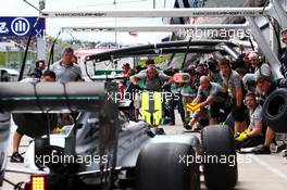 Lewis Hamilton (GBR) Mercedes AMG F1 W05 practices a pit stop. 20.06.2014. Formula 1 World Championship, Rd 8, Austrian Grand Prix, Spielberg, Austria, Practice Day.