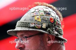 A fan with badges in his hat. 20.06.2014. Formula 1 World Championship, Rd 8, Austrian Grand Prix, Spielberg, Austria, Practice Day.